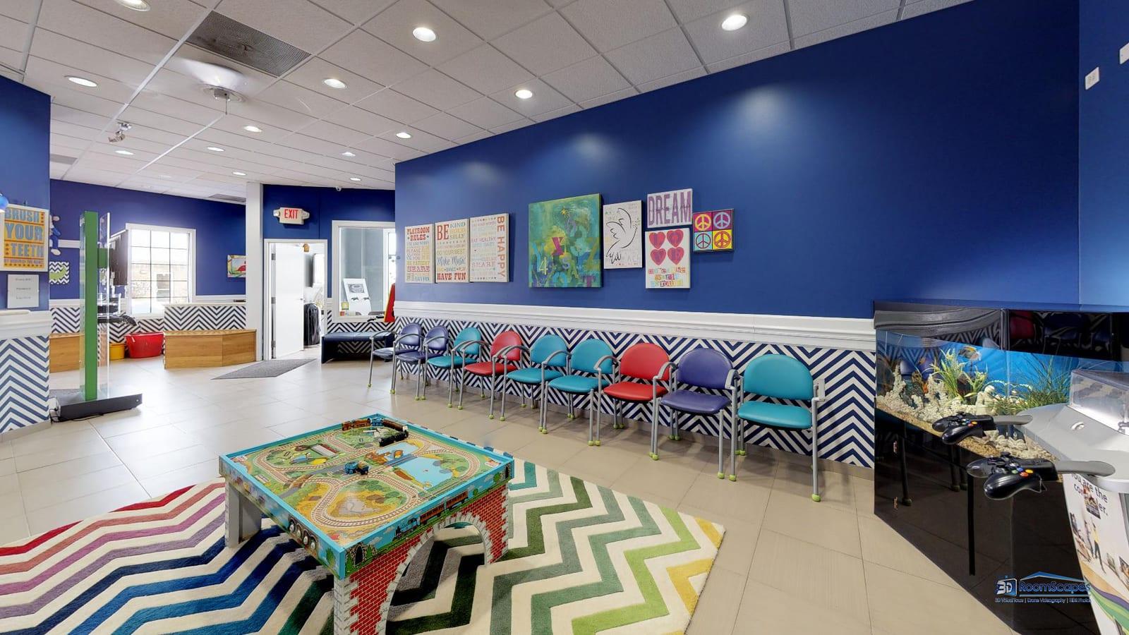 Welcoming waiting room at Kids Dentist Grayslake with colorful child-friendly furniture and play areas