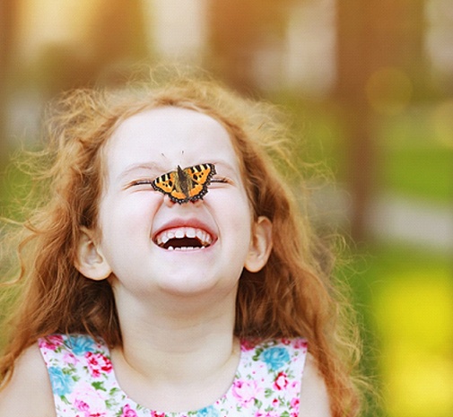 Girl with butterfly on nose in Grayslake