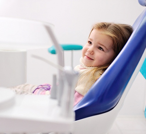 Toddler in chair at pediatric dentist in Grayslake