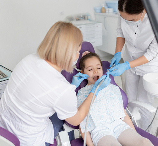 Child in Grayslake relaxing during gentle tooth removal