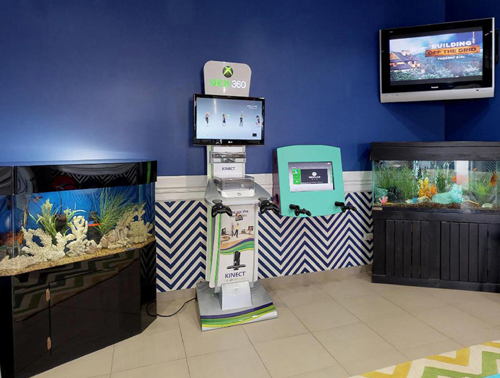 Video games and fish tanks in waiting room