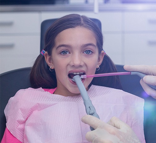 Dentist using intraoral camera to capture smile images