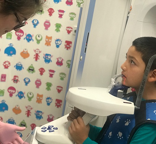 Child receiving digital x-rays