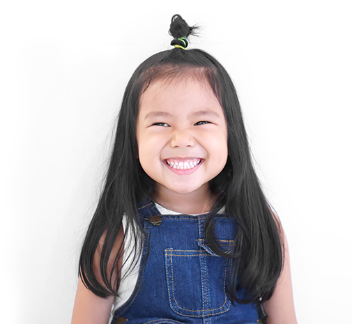 Little girl smiling after dentistry for toddlers