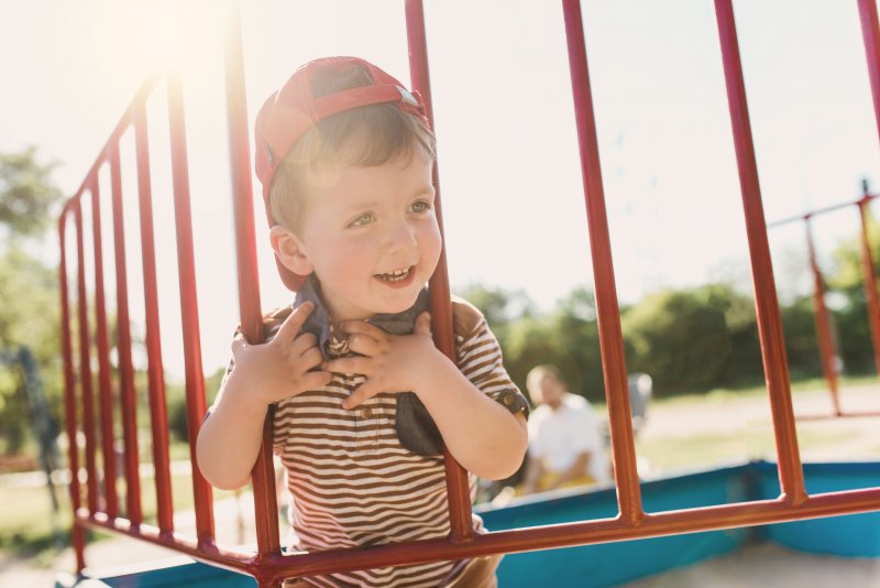 a two-year-old boy on playground