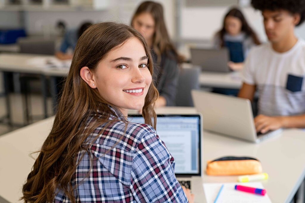 Teen smiling at school